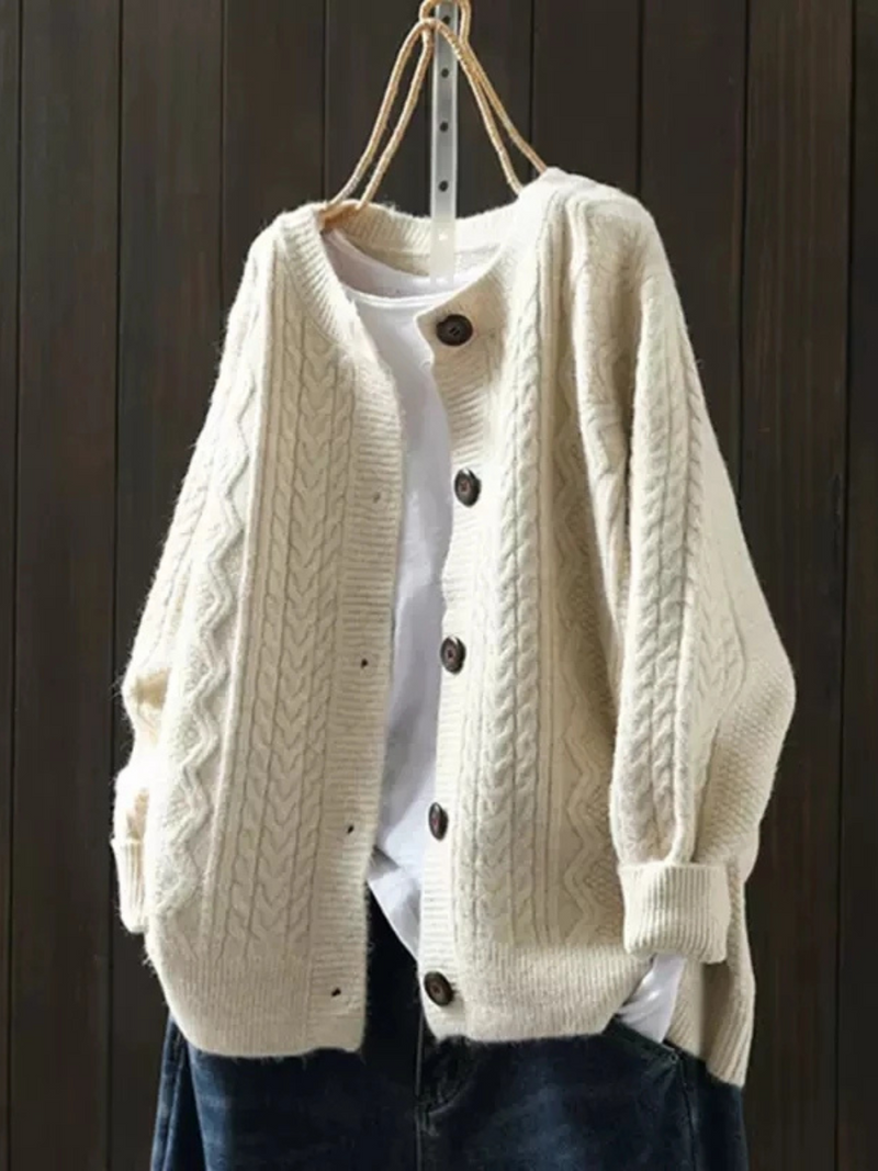 JOANNE | Cable knit sleeves, buttons down the front