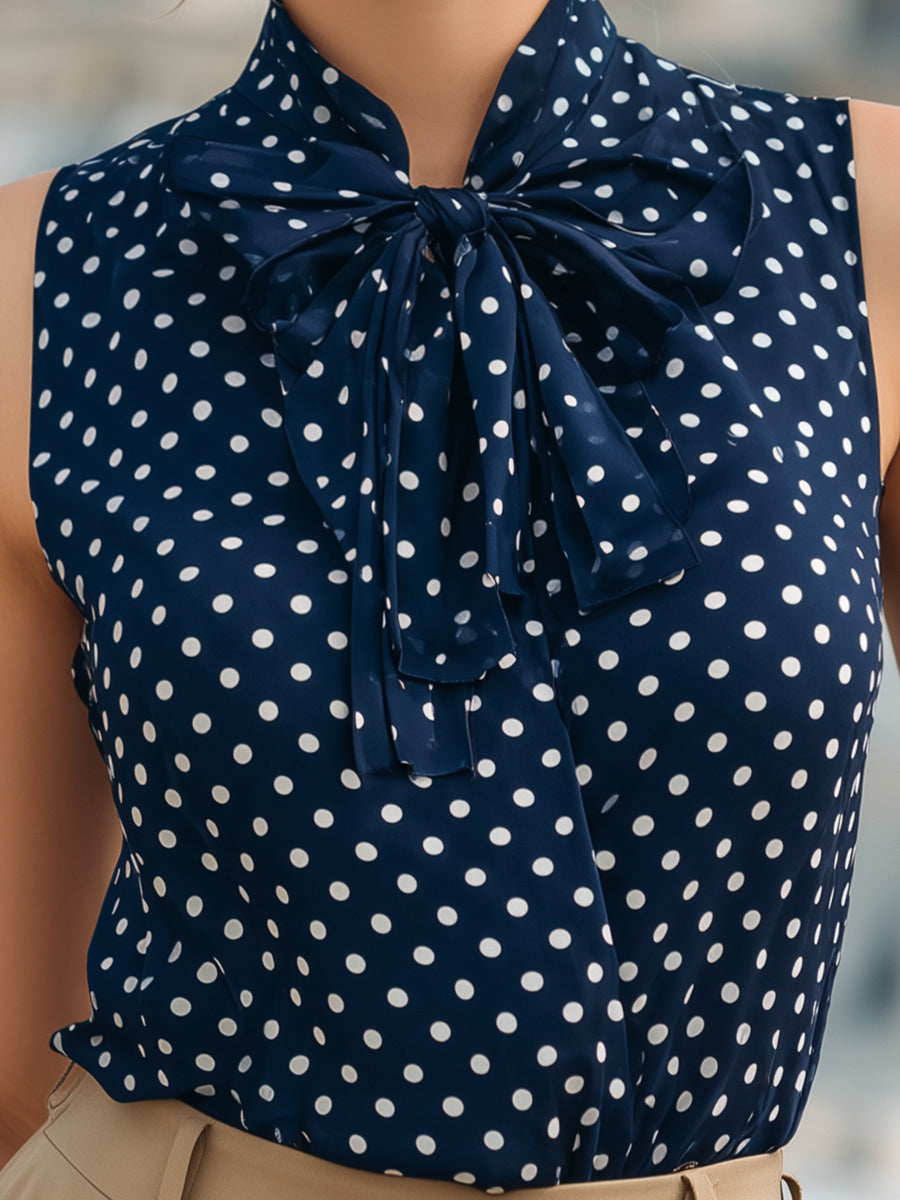ELLEN | Sleeveless polka dot with a bow neck