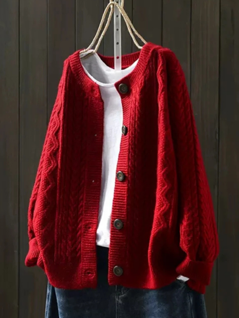JOANNE | Cable knit sleeves, buttons down the front