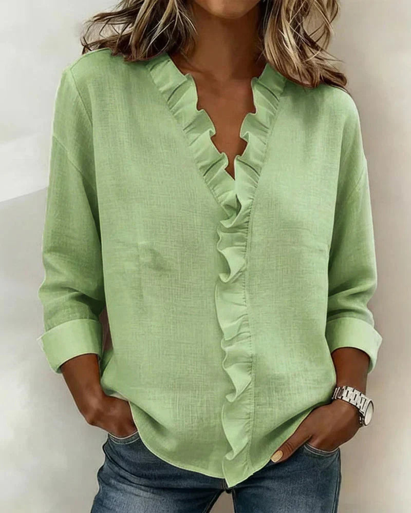 DONNA | Ruffled front blouse to wear under a jacket