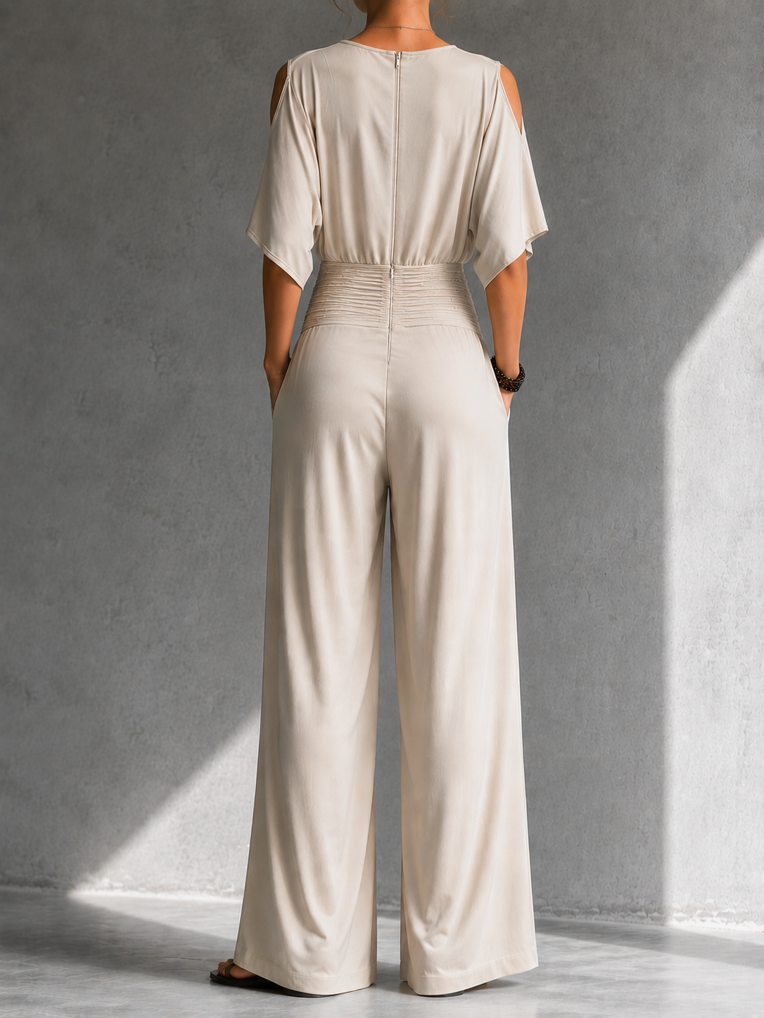GERALDINE | Wrap-front jumpsuit with a tie waist