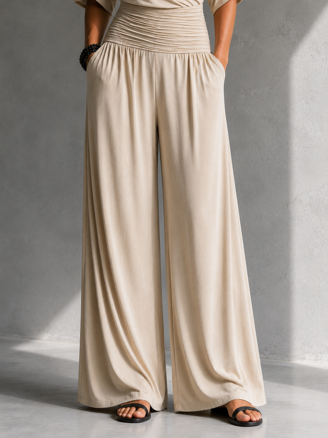 GERALDINE | Wrap-front jumpsuit with a tie waist