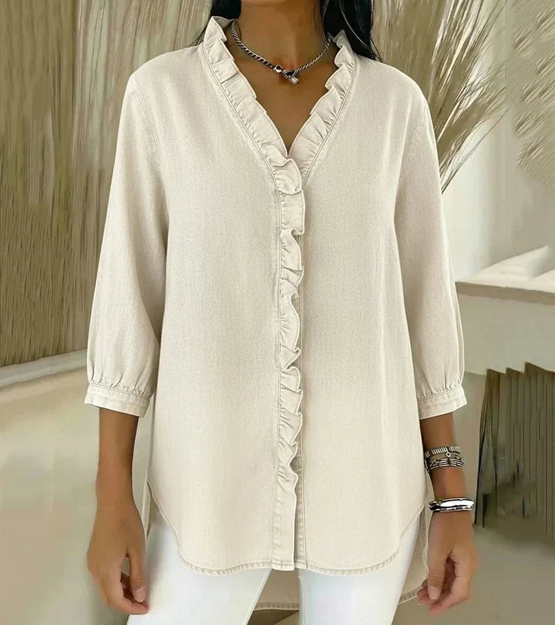 MABEL | Soft denim blouse with a ruffled V-neck