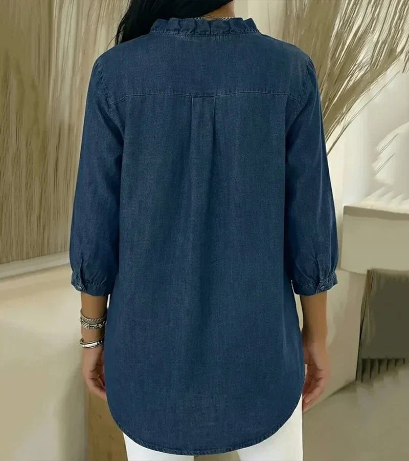 MABEL | Soft denim blouse with a ruffled V-neck