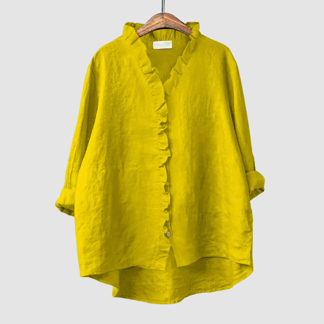 EUGENIA | Ruffle trim blouse with a high low hem