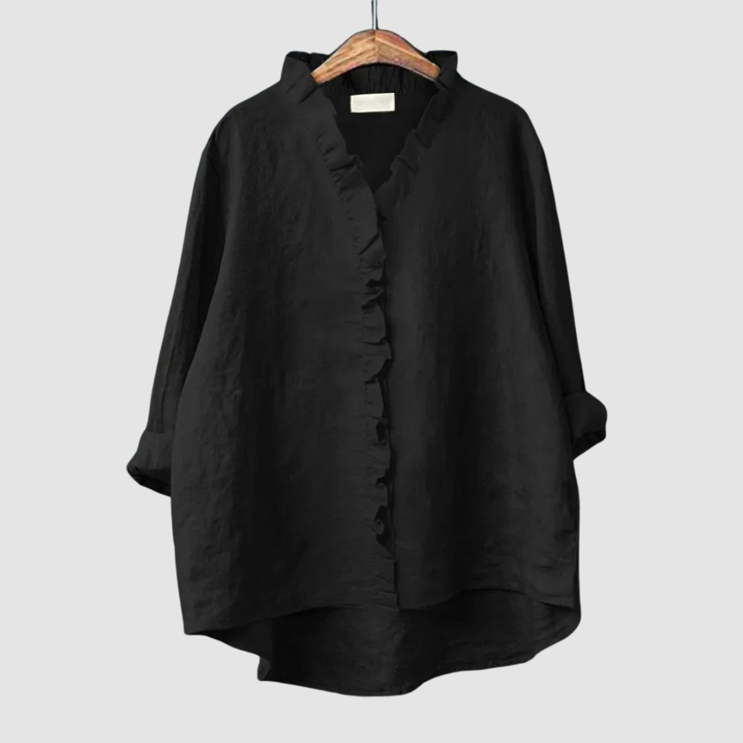 EUGENIA | Ruffle trim blouse with a high low hem