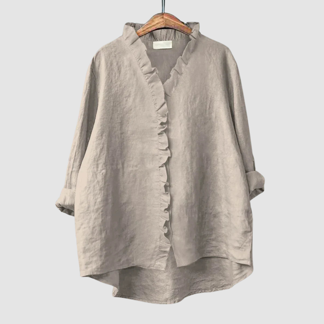 EUGENIA | Ruffle trim blouse with a high low hem