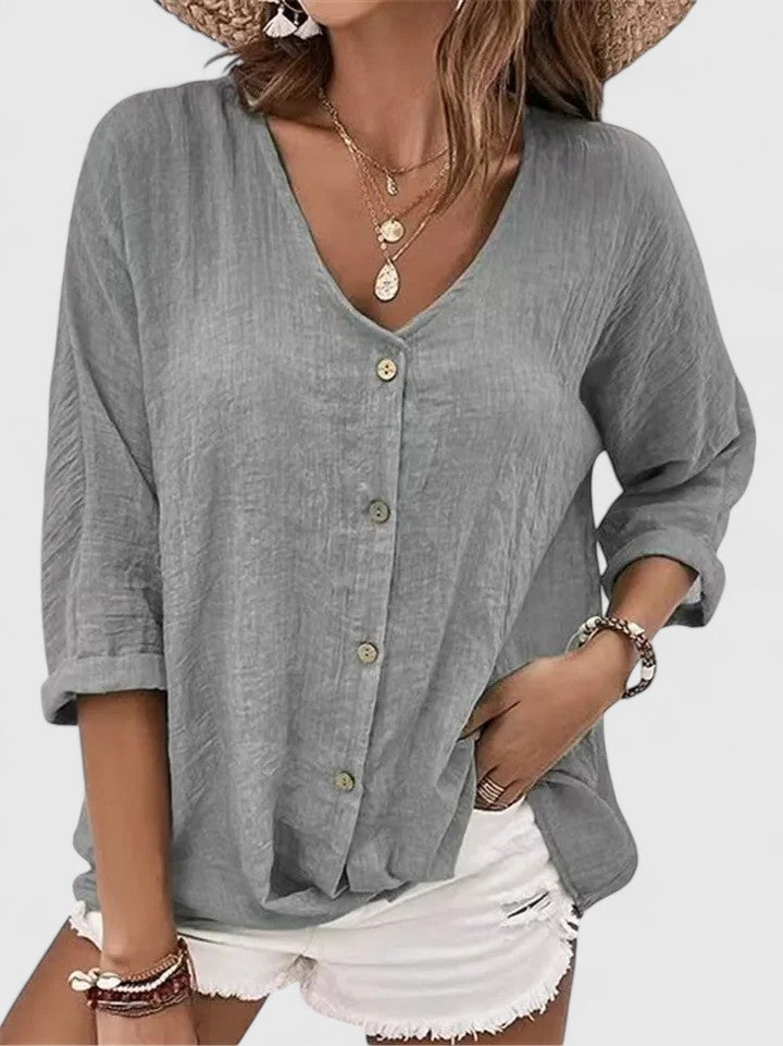 MARGARET | V-neck with a button detail