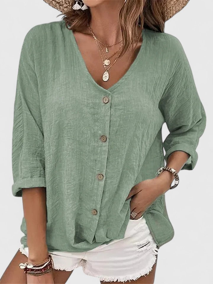MARGARET | V-neck with a button detail