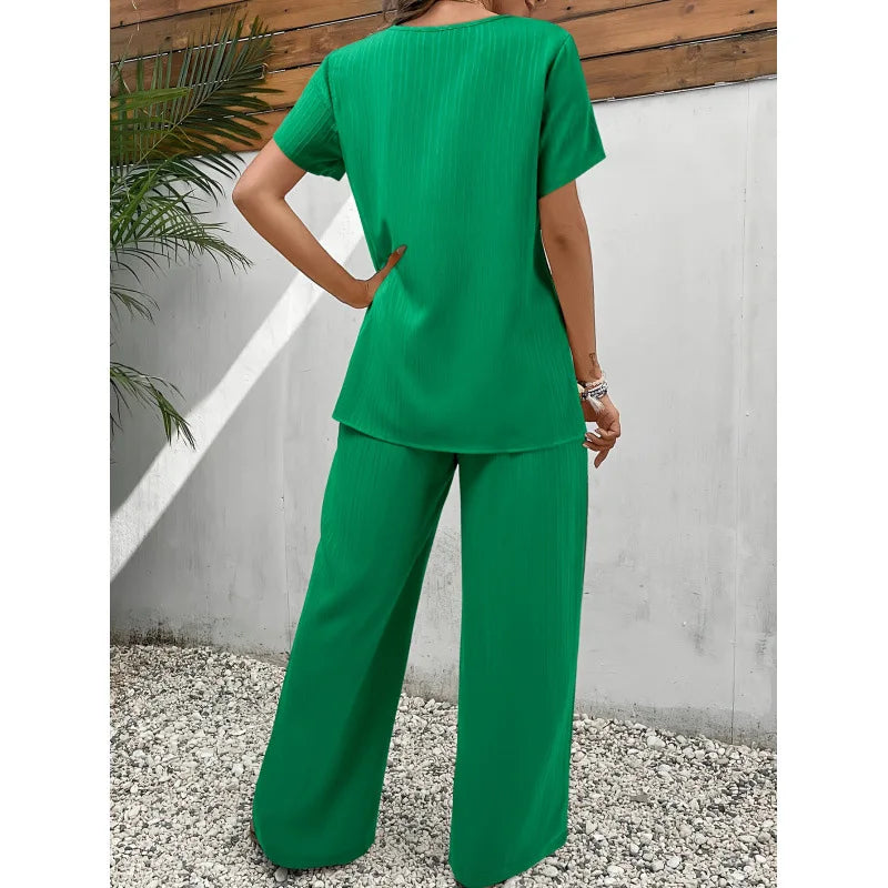 ANNETTE | Asymmetrical blouse and relaxed pants