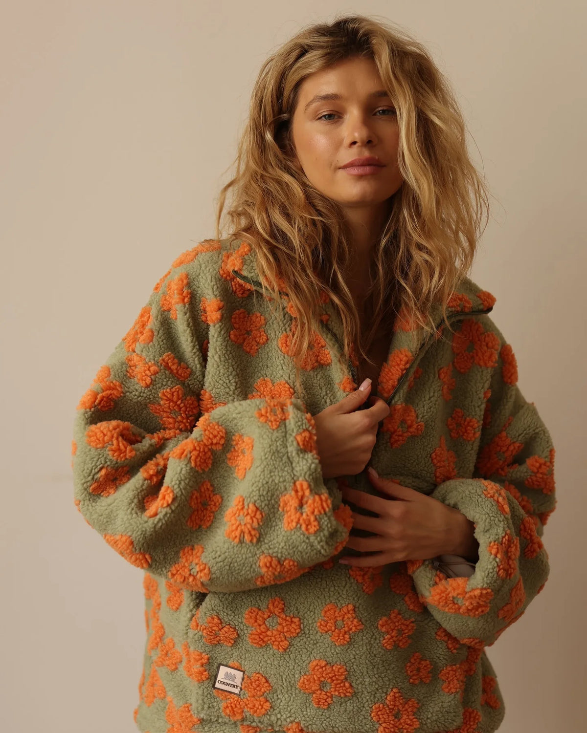 ELOISE | Lined half zip pullover with a floral print