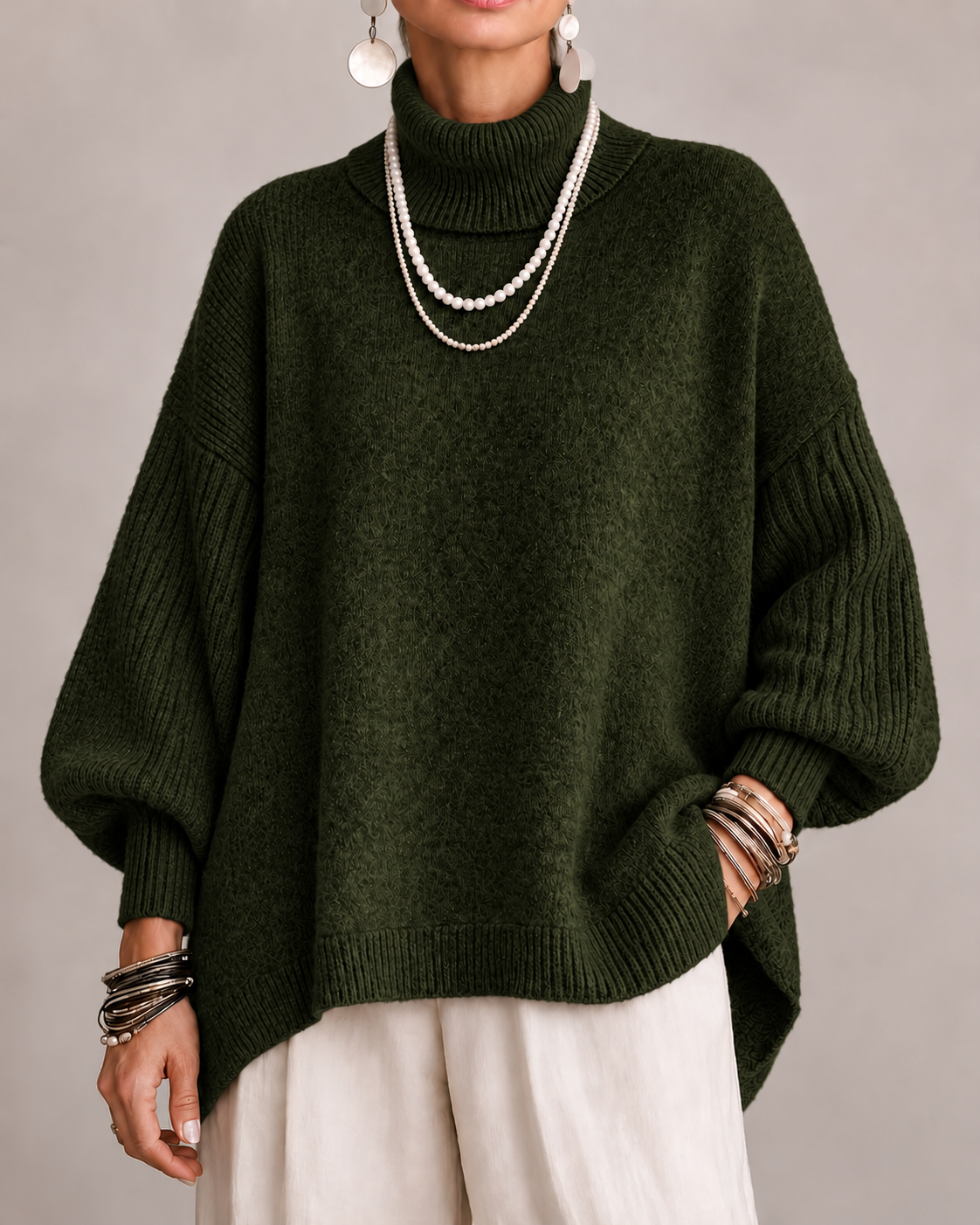 KATHLEEN | Oversized turtleneck with a dipped hem