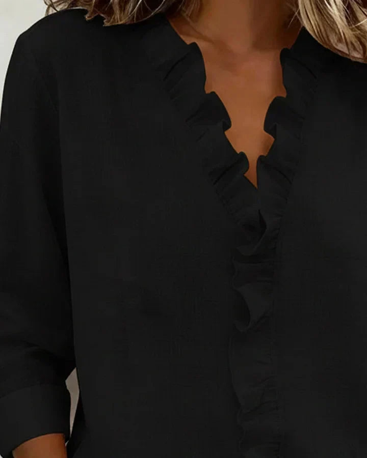 DONNA | Ruffled front blouse to wear under a jacket