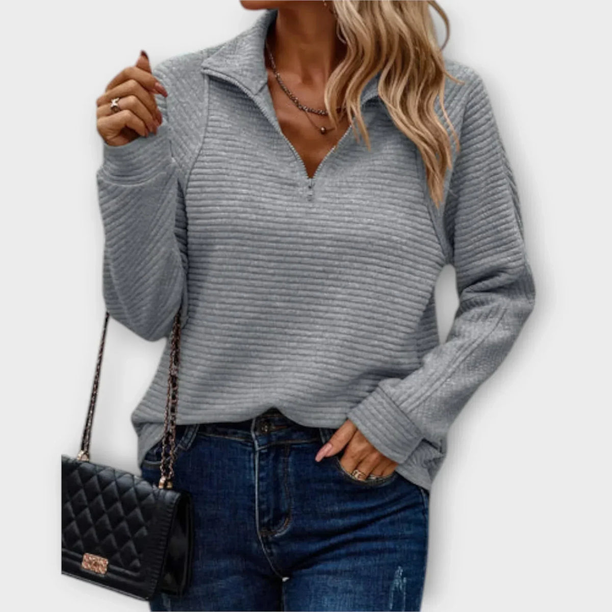 NORA | Half zip that opens to a V